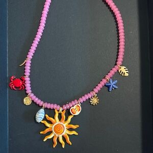 Pink Beaded Sun Charm Necklace with Ocean Charms
